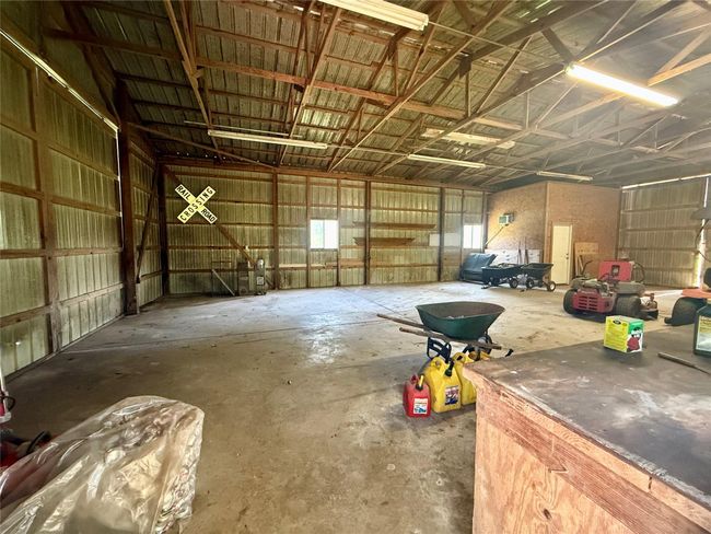 Built in counters and storage in barn/shop | Image 29