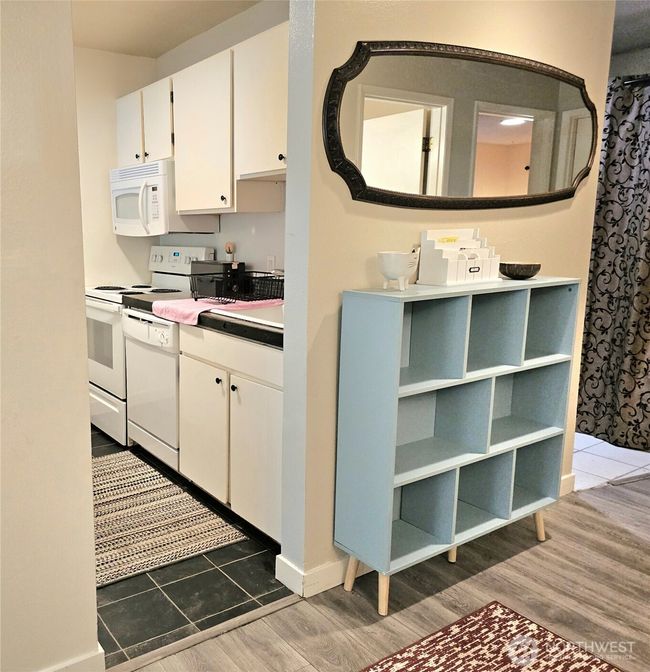 Around the hallway is the kitchen. | Image 7