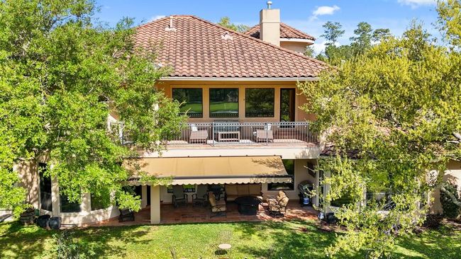 Two covered patios provide plenty of space for outdoor relaxation, dining & entertaining. | Image 48