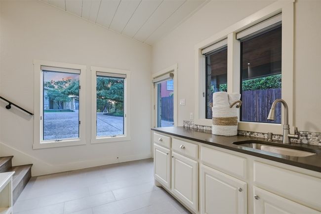 A well-designed mudroom keeps the home clean and organized, with hooks and cubbies for coats and shoes | Image 19