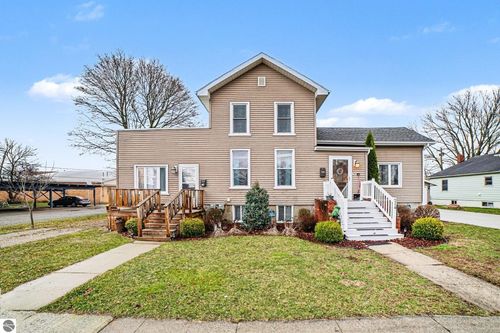 214/216 N Pine Street, St Louis, MI, 48880 | Card Image