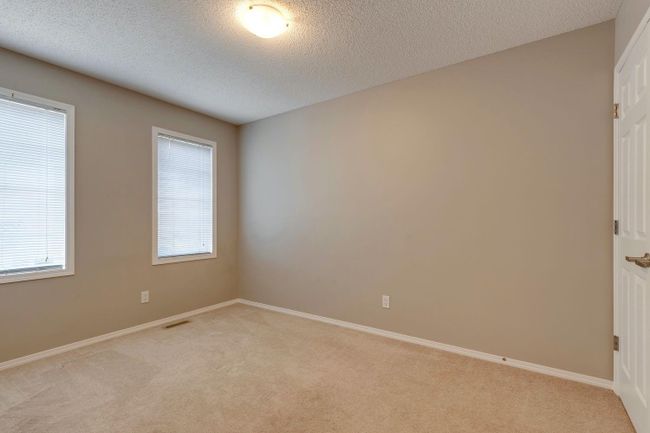 960 Windsong Dr Sw, Home with 3 bedrooms, 2 bathrooms and 4 parking in Airdrie AB | Image 22
