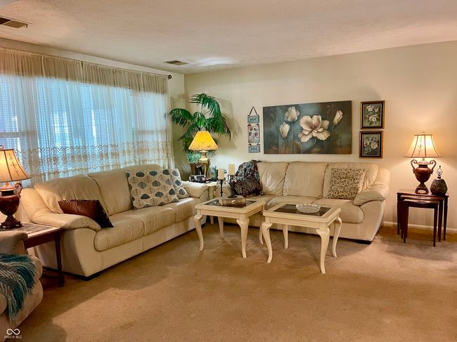 living room opens to the dining room | Image 22