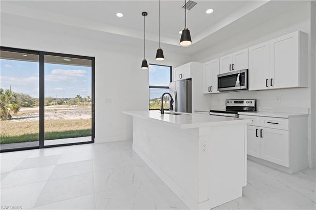 3129 71 St St W, House other with 3 bedrooms, 2 bathrooms and 2 parking in LEHIGH ACRES FL | Image 9