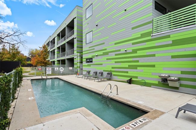 Community pool with a patio | Image 26