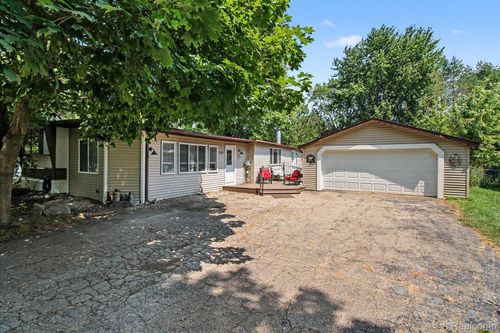 521 Cherokee Bend, Genoa Township, MI, 48843 | Card Image