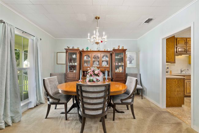 View of front yard and entrance to kitchen | Image 14