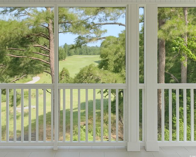 Unfurnished sunroom with healthy amount of natural light, view of wooded area, and view of golf course | Image 27