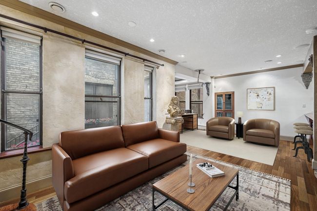 *Virtually Staged* living room area. Previously this area has been used for a 10-person dining table. | Image 8