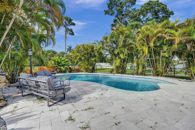 502 Rambling Drive Cir, House other with 5 bedrooms, 3 bathrooms and null parking in Wellington FL | Image 37