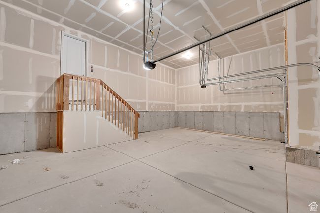Garage featuring a garage door opener | Image 42