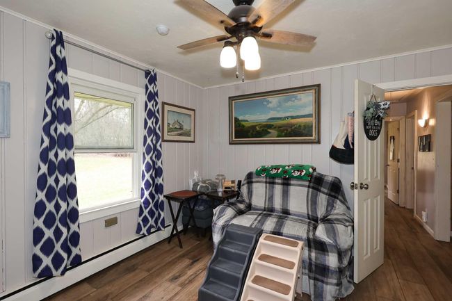 This is a large walk through bedroom. | Image 17