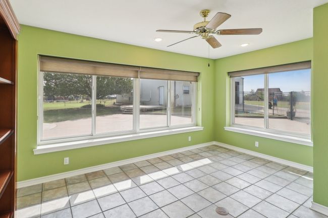 Sunroom or office space. | Image 19