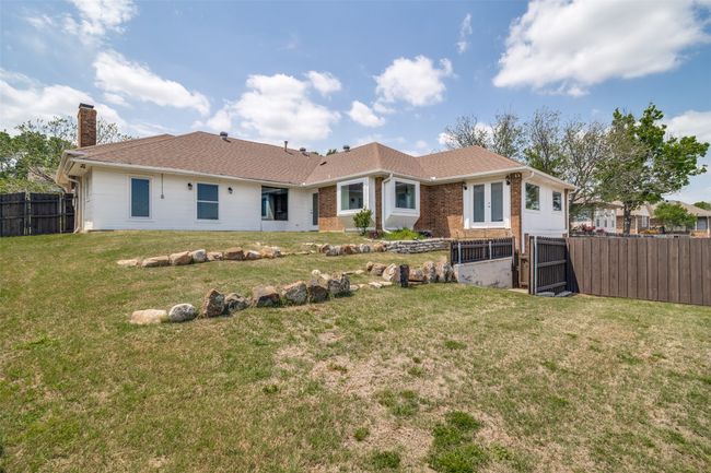 Back of house with large backyard. | Image 25