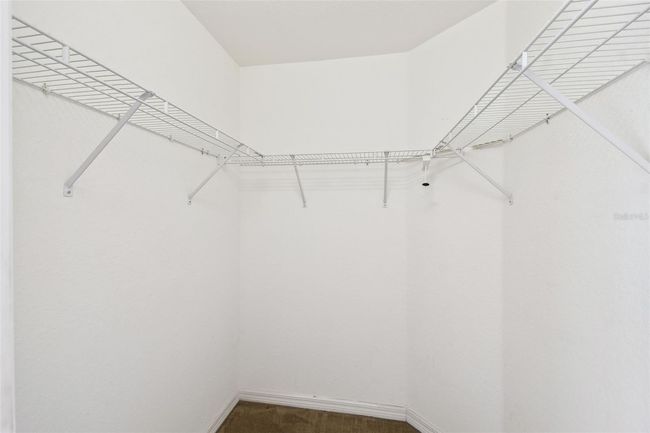 Walk-in closet in Primary Bedroom | Image 13