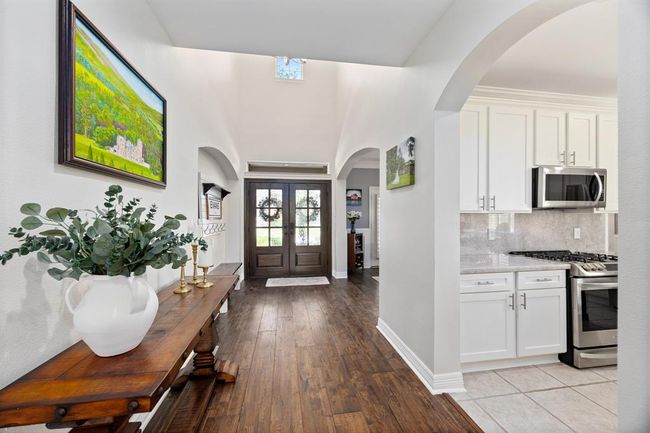 A look from the living room towards the front doors. | Image 18