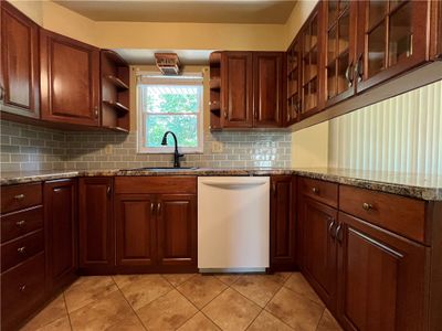 Equipped kitchen with nice view from kitchen sink. | Image 3