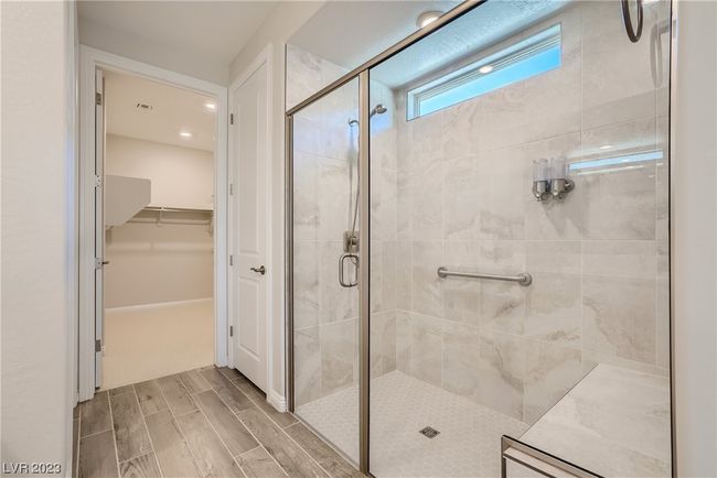 Bath with Dual Sinks, Open Shower with Seat and TOTO Toilet Seats | Image 20
