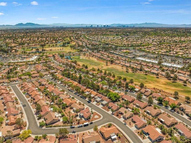 Experience premier golf & resort-style living in the renowned Sun City Summerlin community, offering four exceptional recreation centers, three championship golf courses, indoor and outdoor pools, a state-of-the-art theater, fully equipped fitness centers, pickleball and tennis courts, a softball field, and an active social calendar designed for vibrant living. Ideally located just minutes from Downtown Summerlin’s upscale shopping and dining, the iconic Las Vegas Strip | Image 39