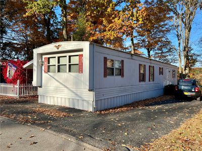 Welcome to 15 Spinet Drive with plenty of parking to accommodate up to 4 cars. | Image 1