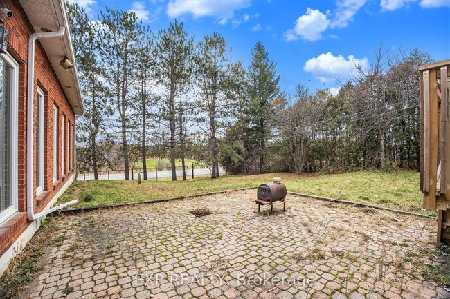 8411 Russell Rd, House other with 7 bedrooms, 5 bathrooms and 30 parking in Navan ON | Image 33
