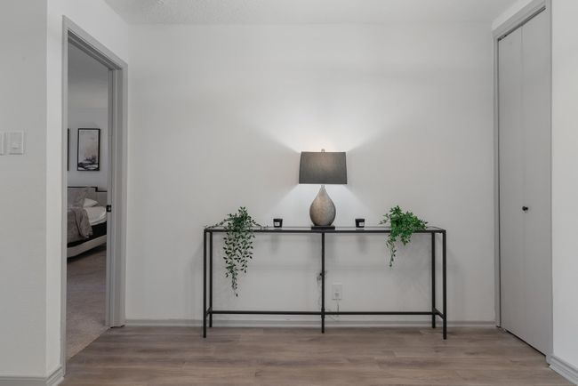 Hall with wood finished floors | Image 4