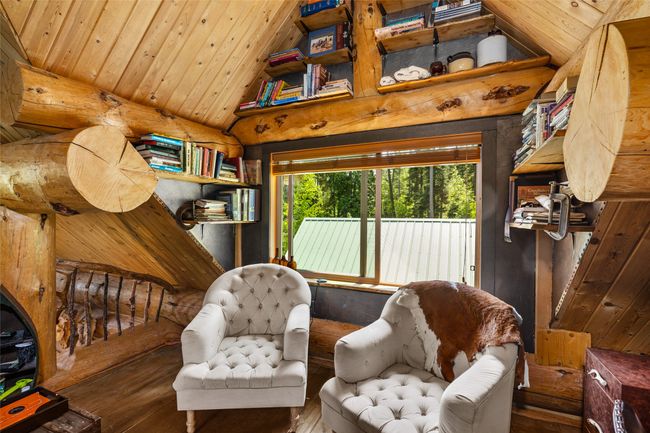 Living area with wood-type flooring, lofted ceiling, and wooden ceiling | Image 25