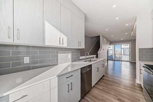 207 Evanscrest Square Nw, Townhouse with 2 bedrooms, 3 bathrooms and 1 parking in Calgary AB | Image 7