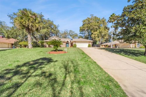 1057 Torchwood Dr, DELAND, FL, 32724-9400 | Card Image