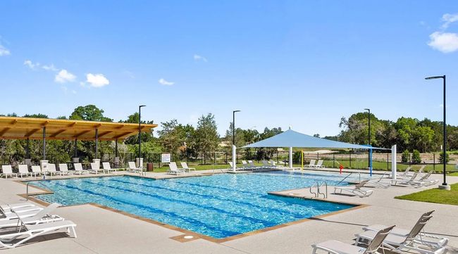 Community pool with a patio and fence | Image 25