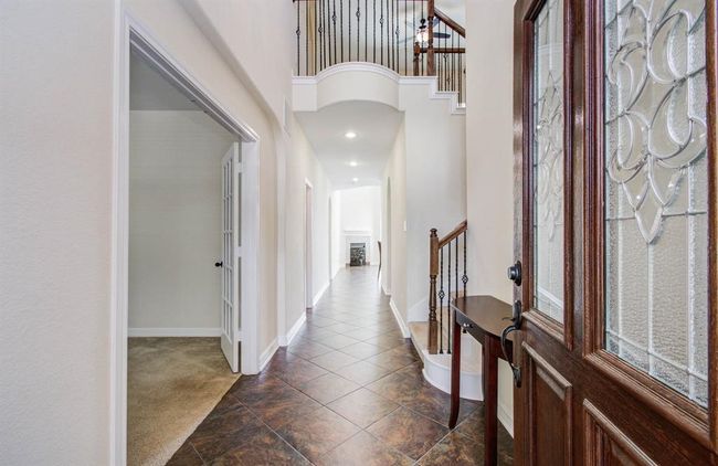 Enter the Foyer. French doors close off the study/home office to left. | Image 4