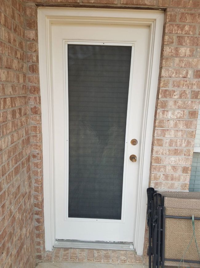 Entrance to property featuring brick siding | Image 4