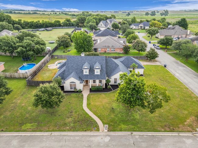 Aerial perspective of suburban area featuring a pool | Image 38