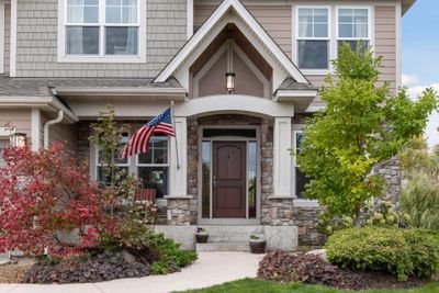 Fall picture of the welcoming entry and front porch | Image 3