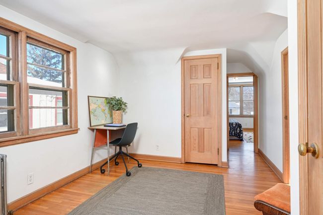The second floor sitting area holds 2 roomy closets. | Image 21