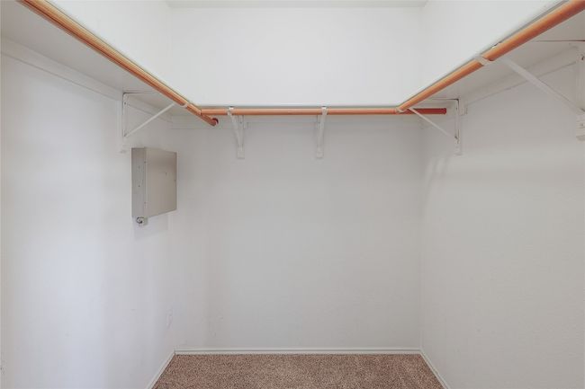 Spacious closet featuring carpet floors | Image 18