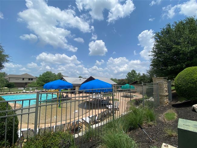View 2 of Pool #1. Shaded areas around the kids play pool. | Image 36