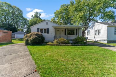 Front yard with pullover to the left of the home for more parking | Image 2