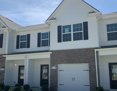 Open concept with plenty of room for seating! Quartz countertops and stainless steal appliances. | Image 2