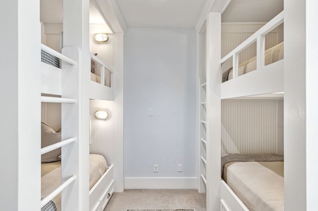 Carpeted bedroom featuring baseboards | Image 27