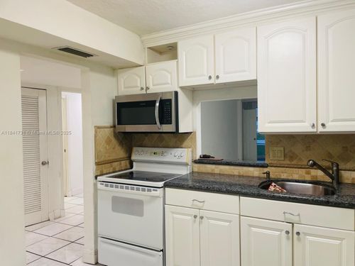 d111-1401 Ne 191st St, Miami, FL, 33179-6104 | Card Image
