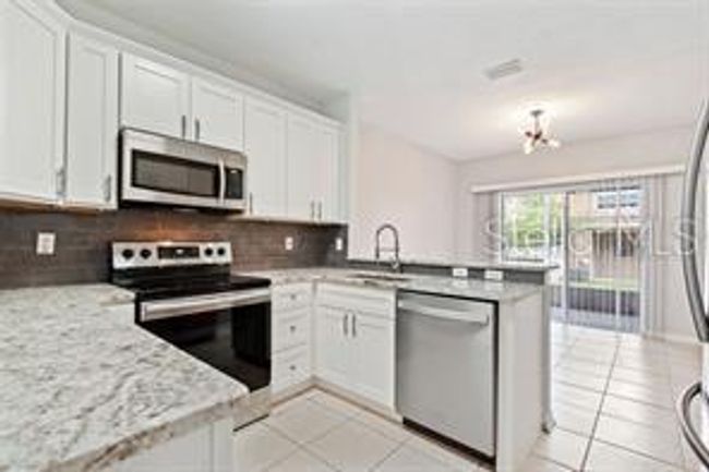 30143 Wellesley Way, Townhouse with 3 bedrooms, 3 bathrooms and null parking in WESLEY CHAPEL FL | Image 6