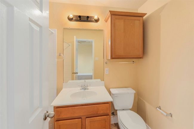 Bathroom featuring vanity and a shower | Image 22