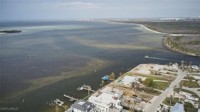 View of property location featuring a nearby body of water | Image 34