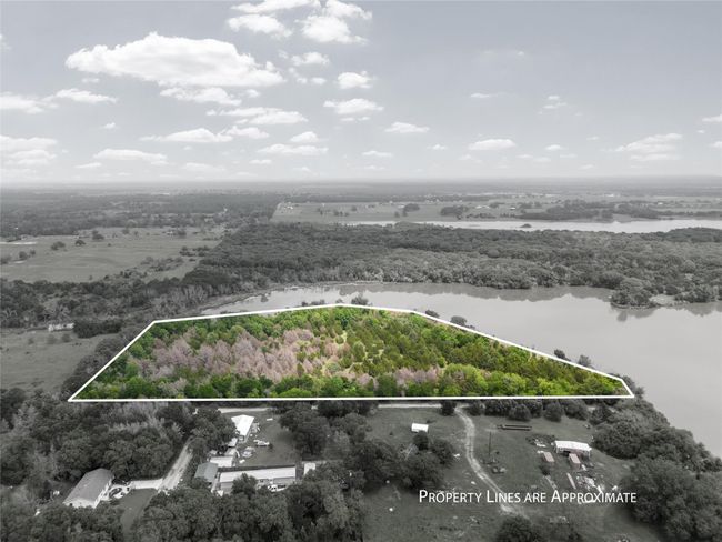 Drone / aerial view with a water view and a forest view | Image 14