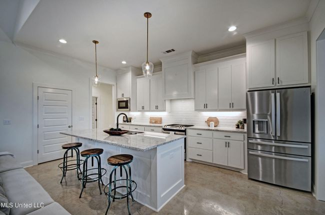 Kitchen with bar top | Image 6
