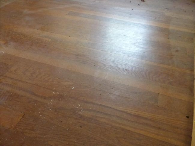 Original hardwood floors are a standout feature—rich with character and ready to shine again. | Image 5