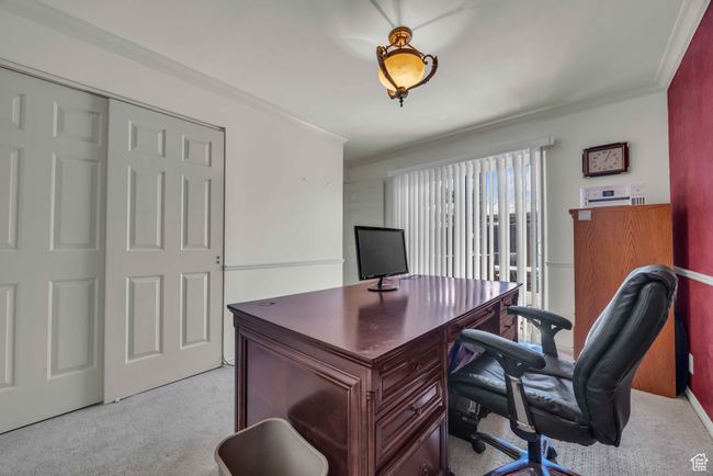 Home office featuring crown molding and light colored carpet | Image 15
