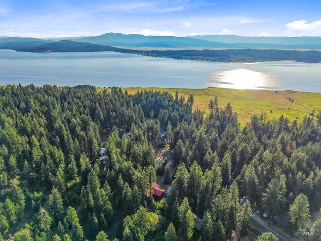 Bird's eye view of a water and mountain view | Image 10