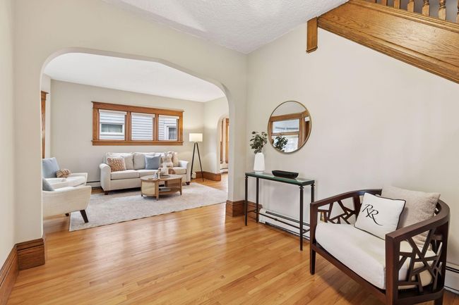 The arched entryway to the living room adds character and style. | Image 5